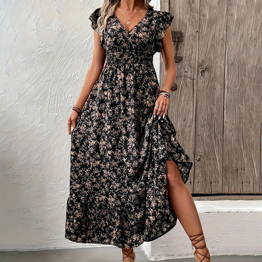 👗50% RABATT NU!🎀Flödande maxiklänning med V-ringning och blommönster
