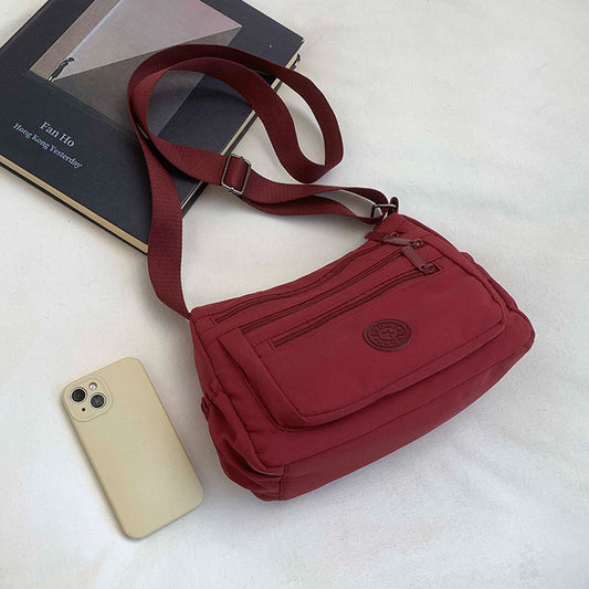 🔥50% RABATT🔥Lätt crossbody-väska i nylon med flera fickor