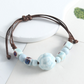 🌿 BEGRÄNSAD TID: 50 % RABATT! ✨ Justerbart armband med keramiska pärlor – etniskt, boho, glidande knut 🔮