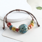 🌿 BEGRÄNSAD TID: 50 % RABATT! ✨ Justerbart armband med keramiska pärlor – etniskt, boho, glidande knut 🔮