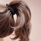 Pince à cheveux volumatrice pour queue de cheva